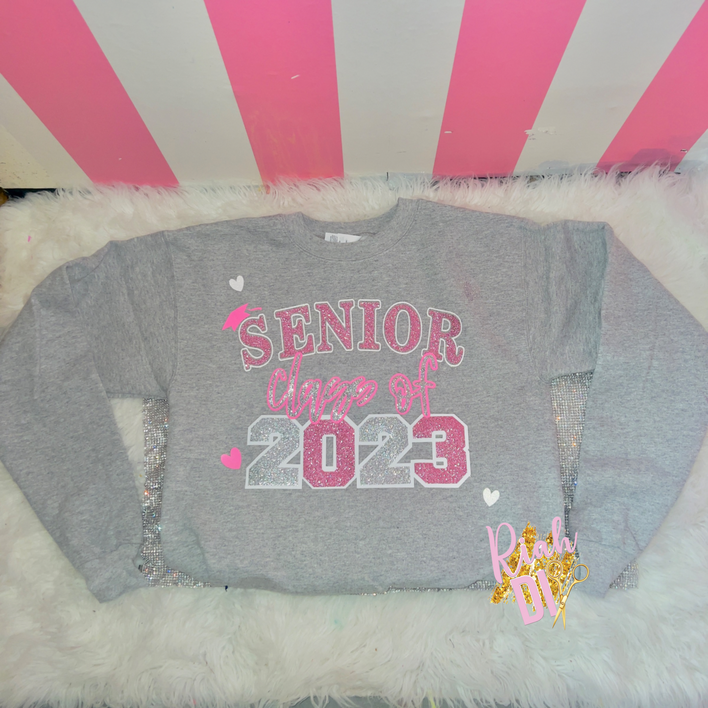 Sudadera con corazón curvo